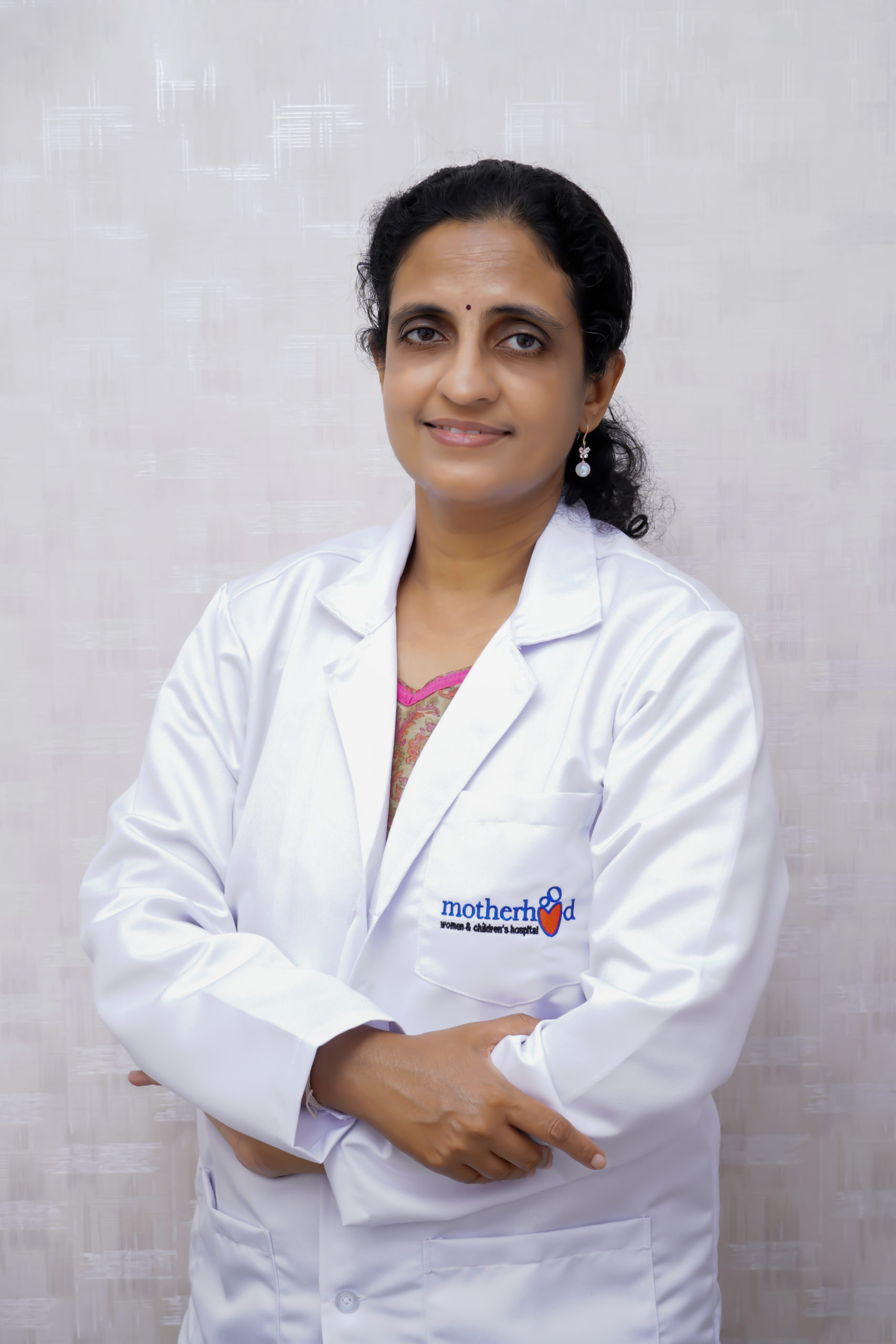 Dr. Meenakshi J
